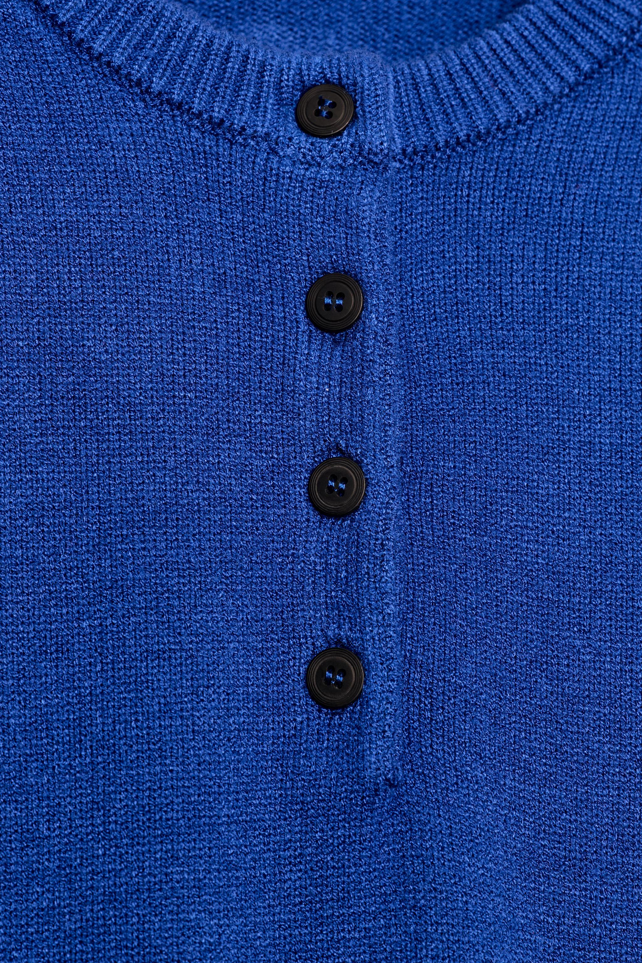 PULL EN MAILLE À MANCHES LARGES